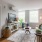 a living room with a couch and a tv