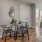 a dining room with a large mirror
