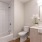a bathroom with a tub toilet and sink